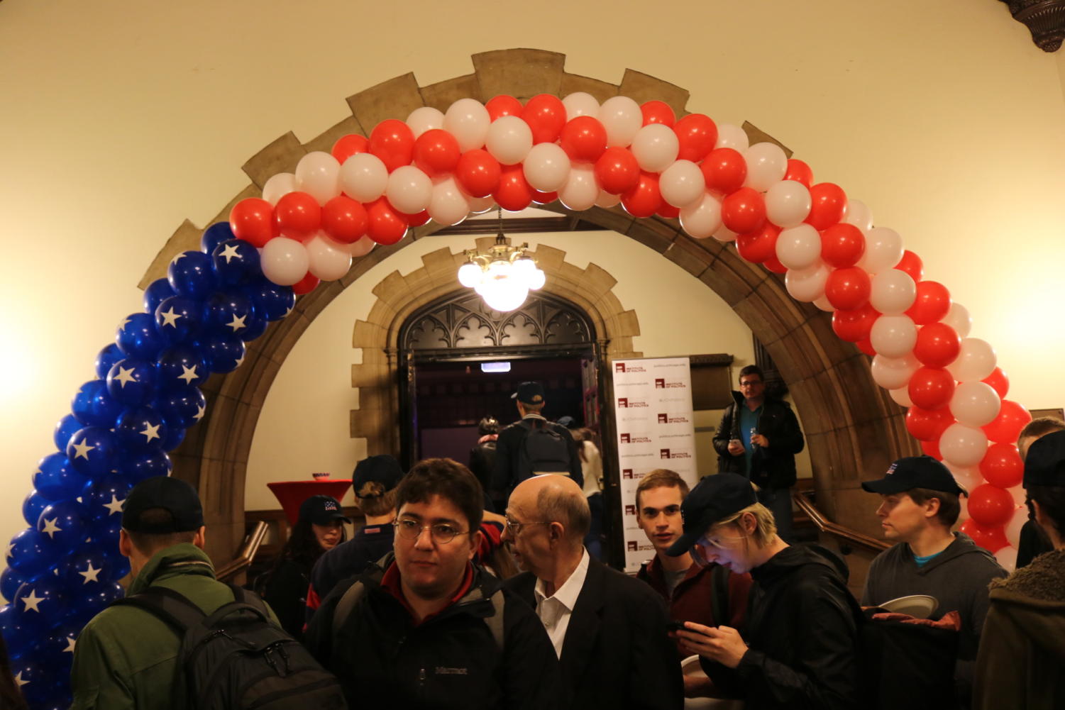 People wait in line for food at the IOP watch party.