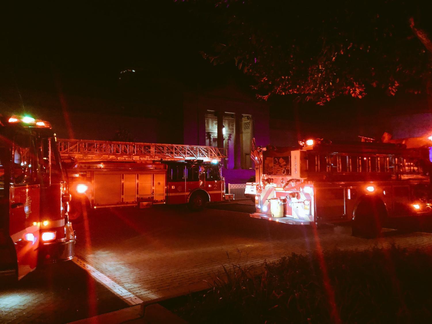 The scene outside the Museum of Science and Industry Monday night, where at least 8 Chicago Fire trucks were stationed in the parking lot.