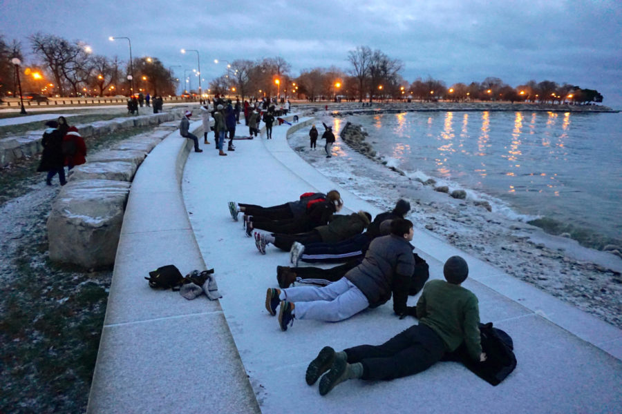 Students stretch at Promontory Point on the last day of Kuvia.