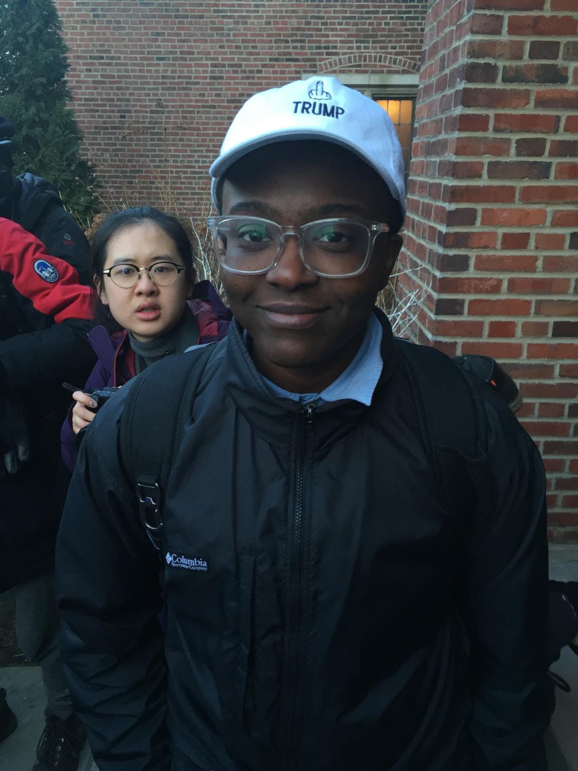 Second-year JT Johnson encouraged protesters to enter the Quadrangle Club and stop the event.