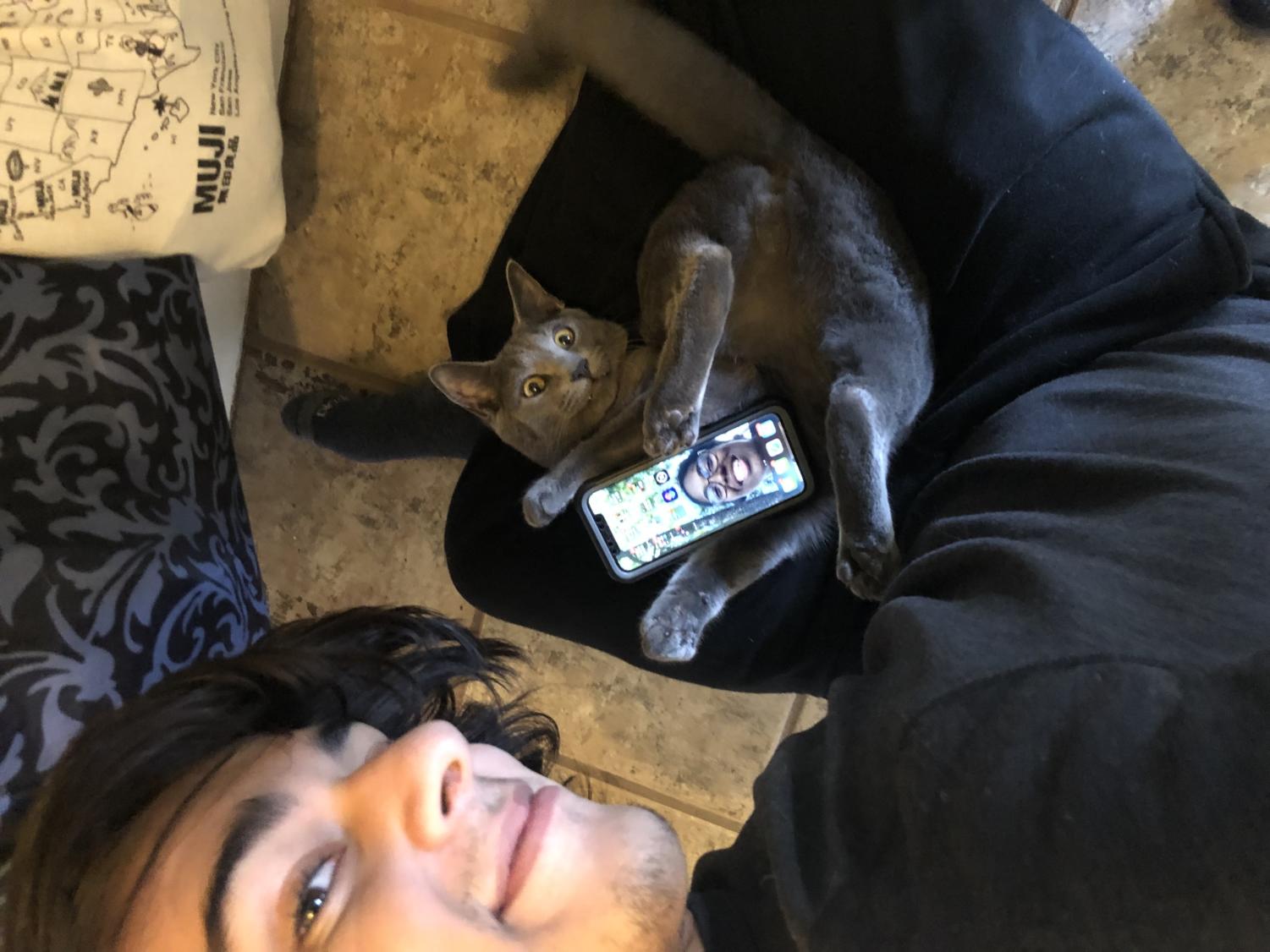 Marcus and his cat, Mako.