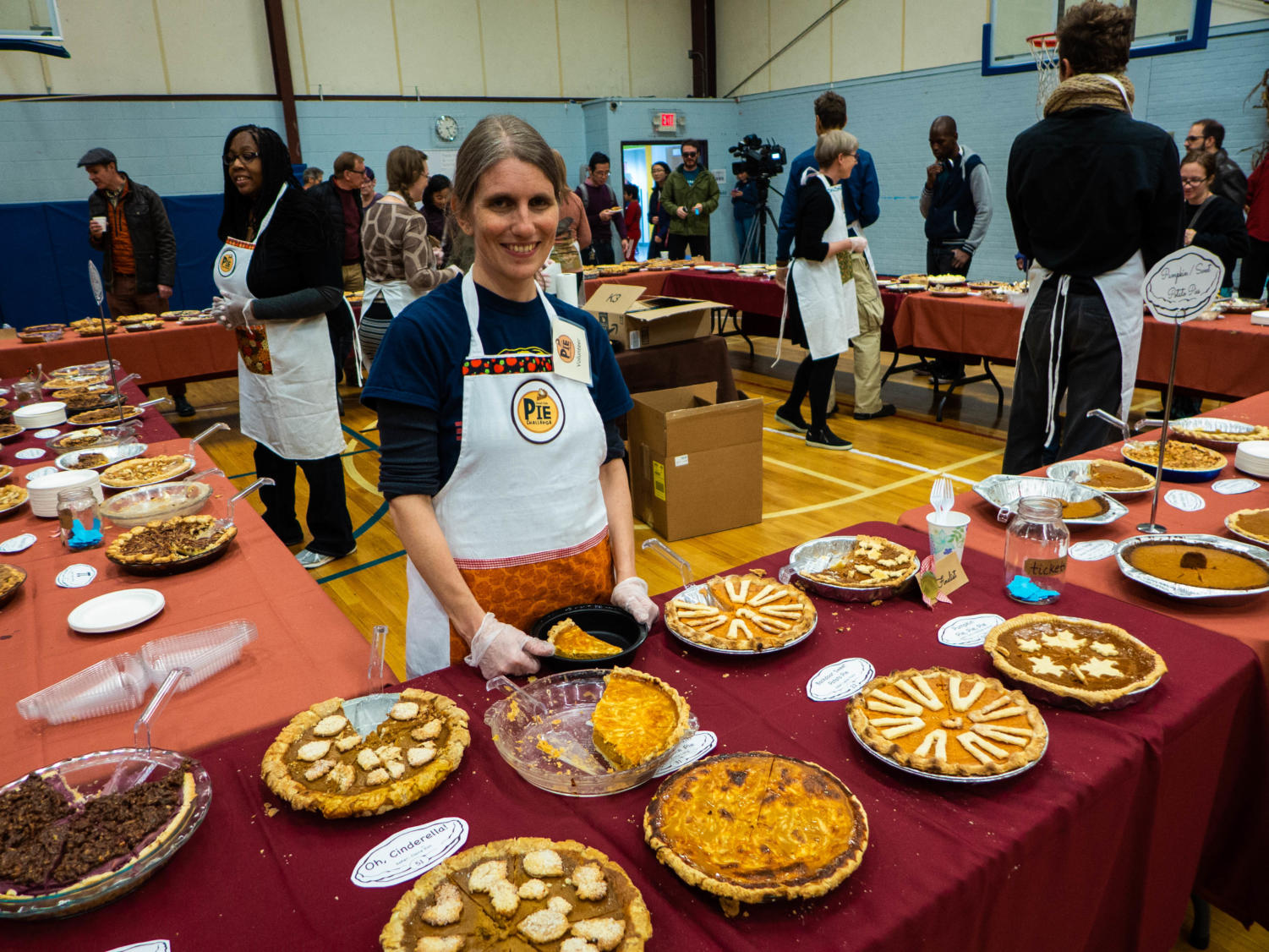 Chris Andrews,  prepares a pumpkin/cheesecake pie. Andrews baked a blueberry rhubarb pie for the event, which sold out within half an hour, and placed third in the fruit pie category.