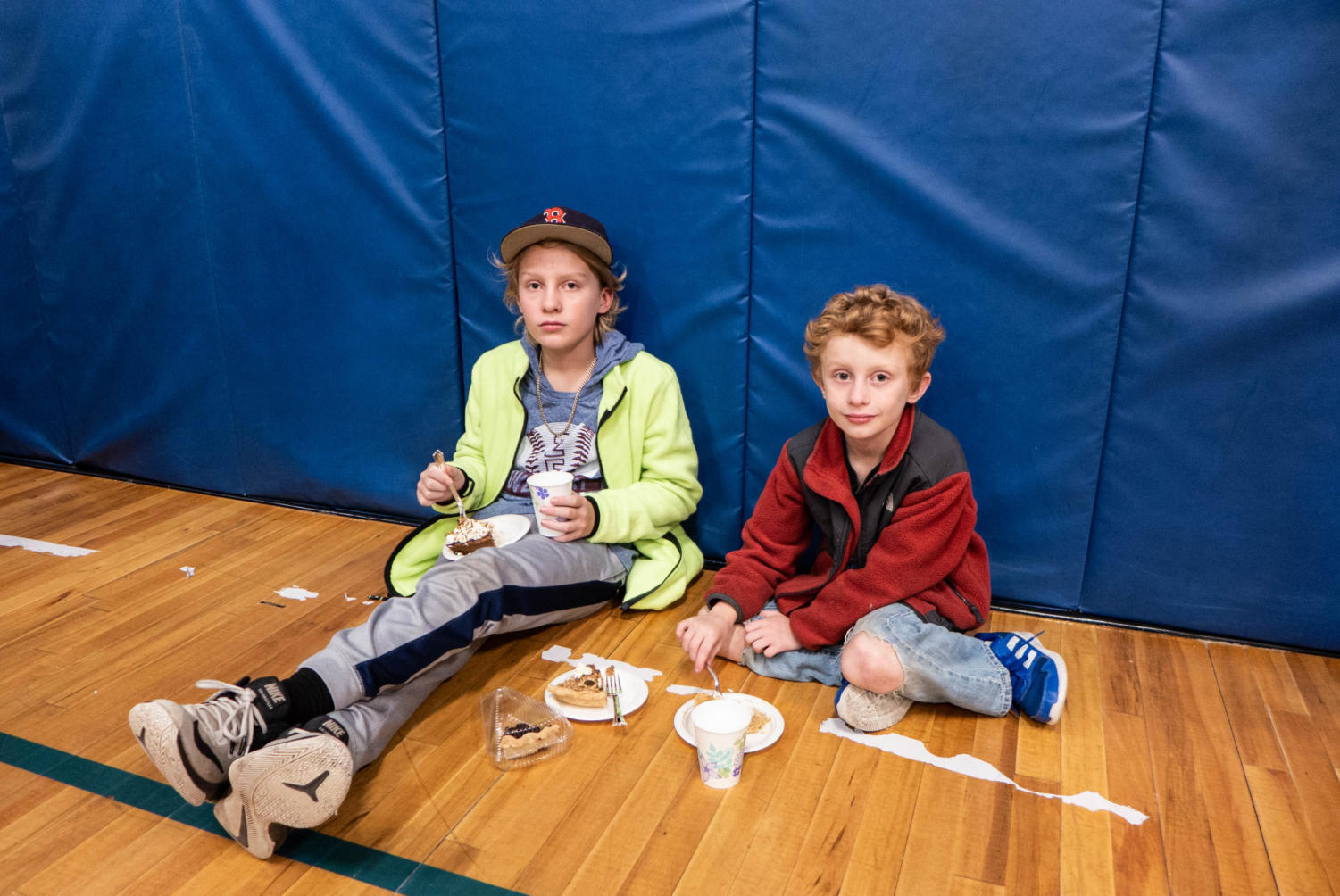 First-timers Sam (left) and Kevin Roma (right) enjoy their slices of pie.