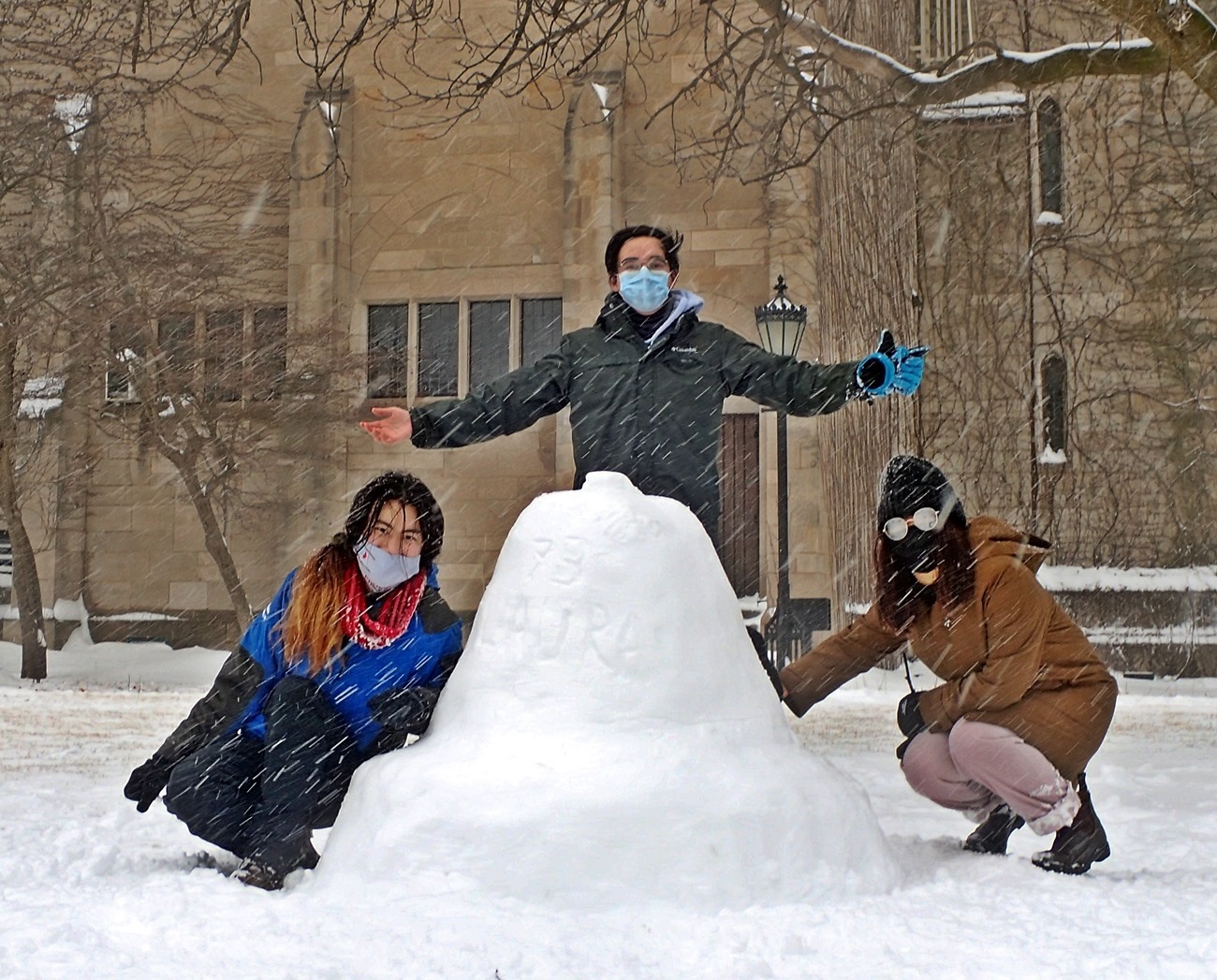 A couple of the guild members, Yibo, João, and Bridget, building the 73rd bell of the carillon.