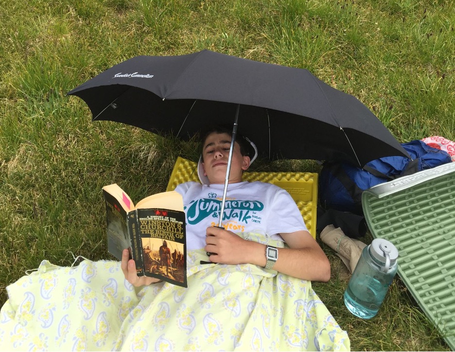 Lewis on a family hiking trip from Aspen to Crested Butte in 2015. “For some reason he was the only one who did not get dirty...He set up a chair for himself and an umbrella to shield himself from the sun. And then he’d read Winston Churchill books.