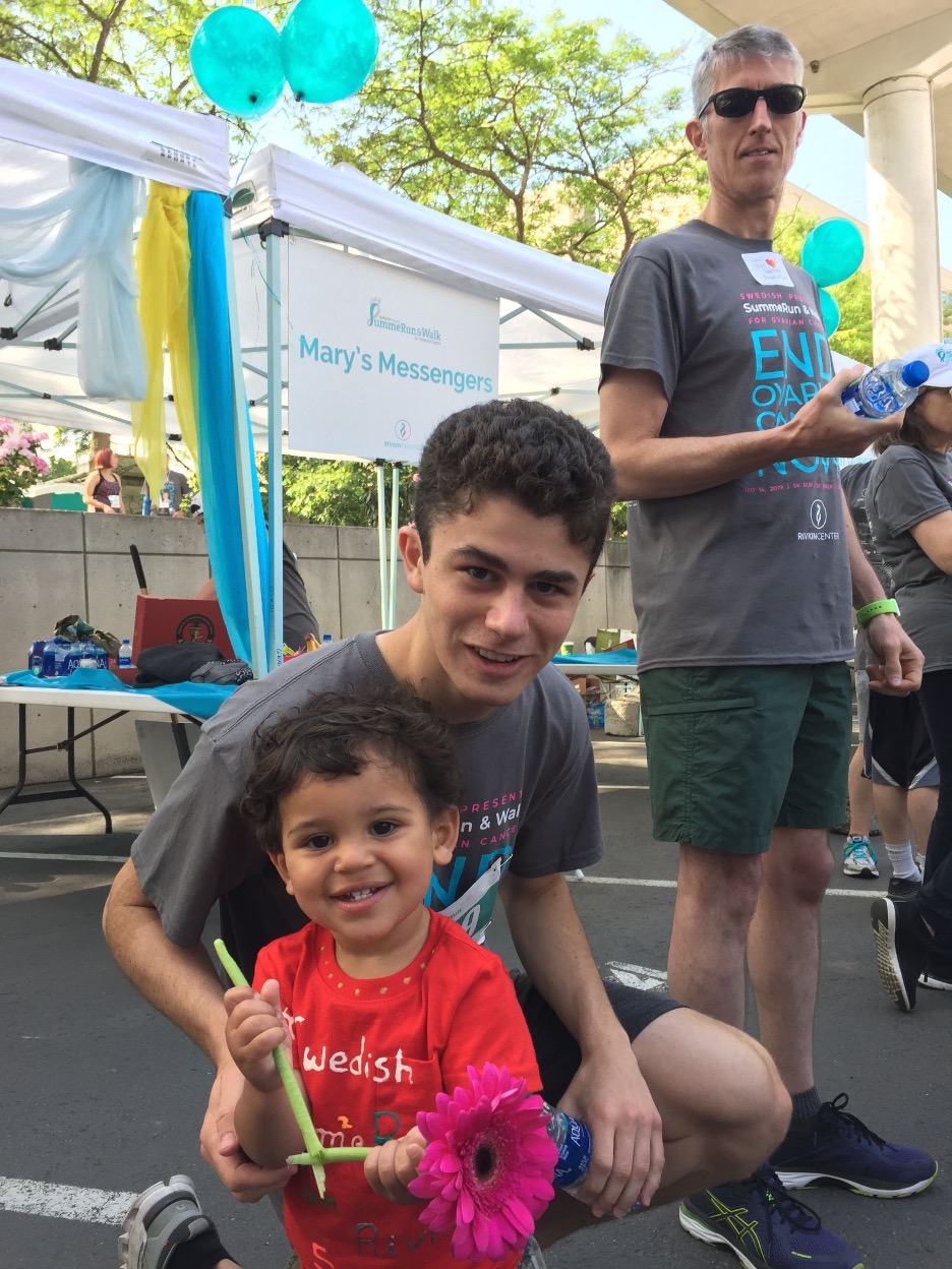 Lewis with his cousin Kai in 2019 during his family’s annual 5K run funding research for ovarian cancer detection and prevention.