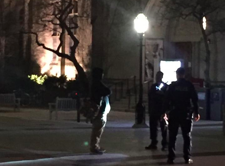 The individual speaks to two UCPD officers the night of March 9.