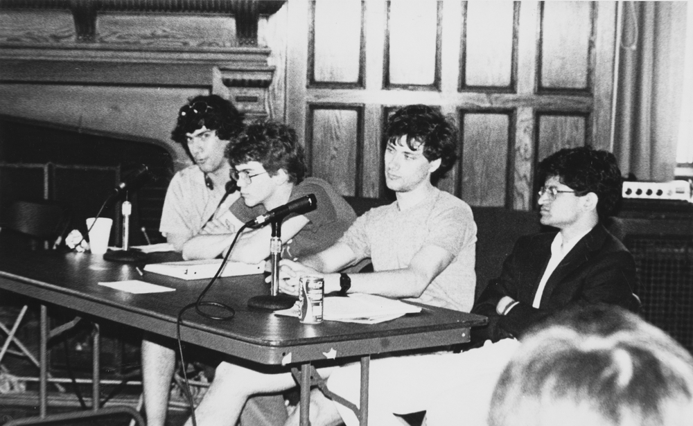 Student Government presidential candidates debate. From left: David Feige of the NERK party; fourth-year Urban Larson of the MEGA party; Guy Yasko of the DEMON party; and second-year student Sanjay Wagle of the POW party. April 19, 1985.