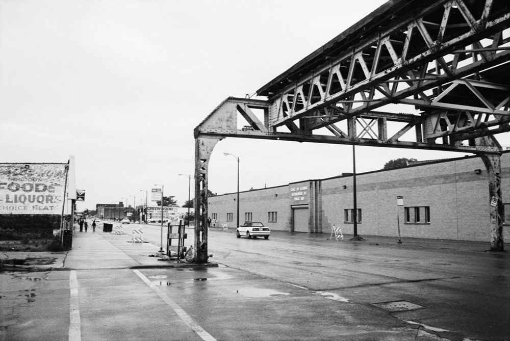 View of unused elevated rail tracks for the Chicago Green Line over 63rd Street at Dorchester Avenue in 1997.