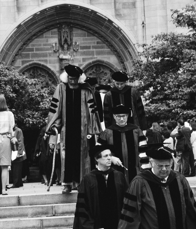 Smith (center, top step), and other faculty and administrators leave Rockefeller Chapel after a University of Chicago convocation. | Undated