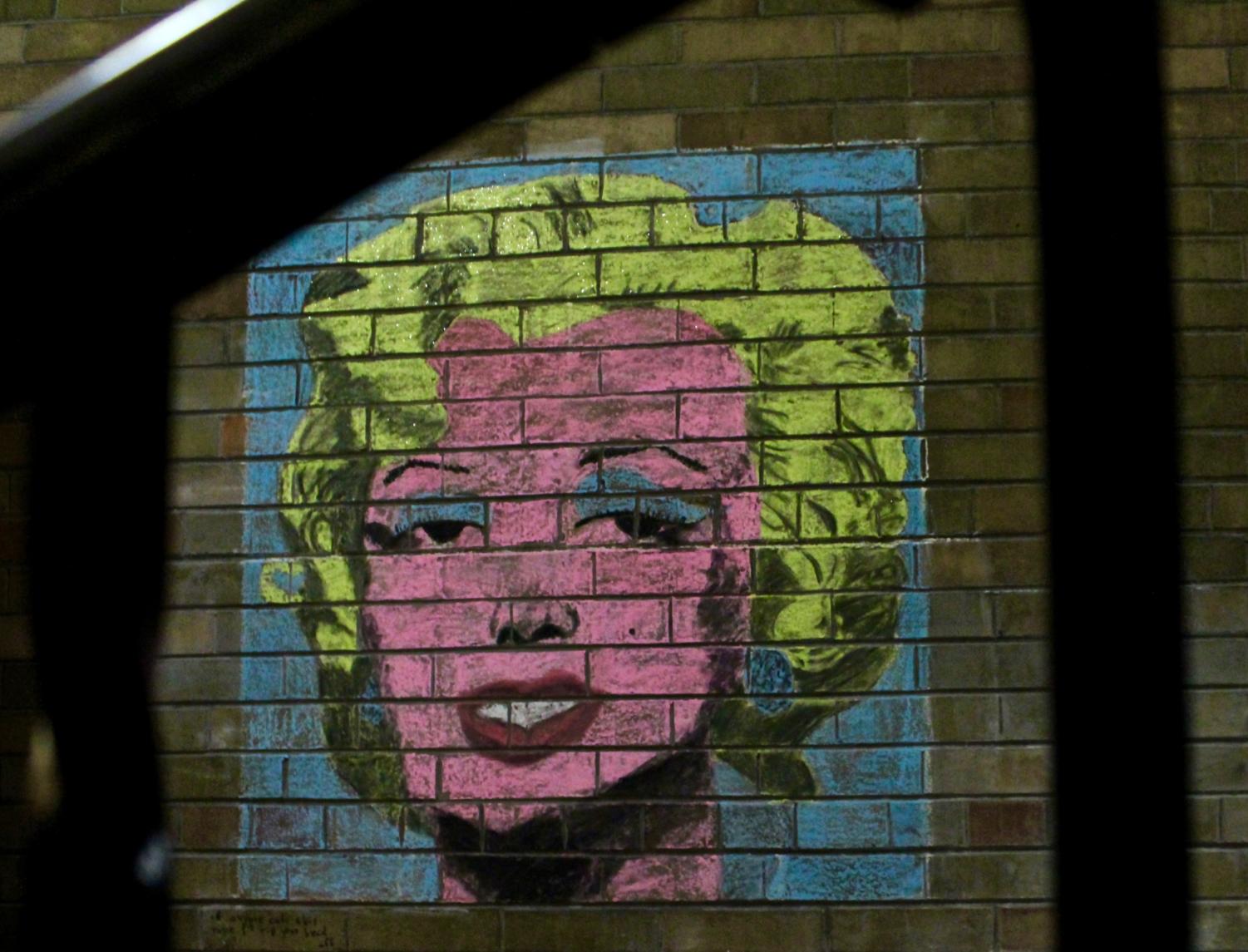 Rachel Hildebrand recreated Andy Warhol’s clasic “Marilyn Diptych” on the walls of Linn-Mathews.