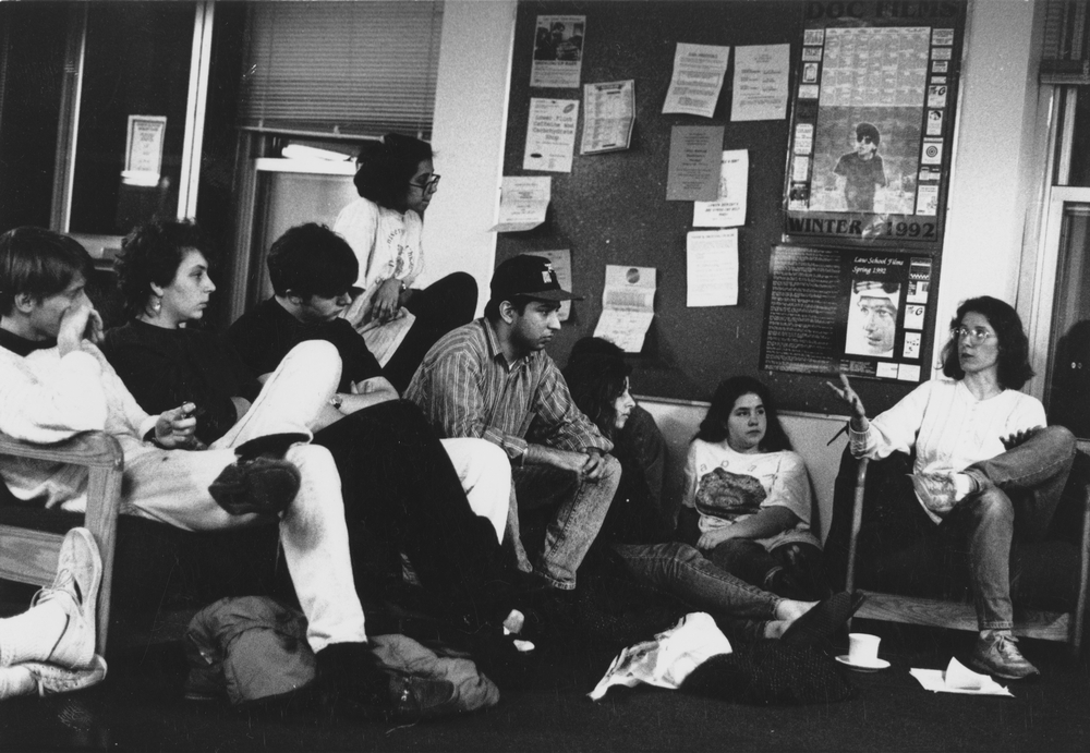 Martina Munsters (right), University of Chicago assistant dean of students, talks to students at Woodward Court dormitory about campus safety. The meeting was held after several recent incidents of sexual assault on campus. 1992.
