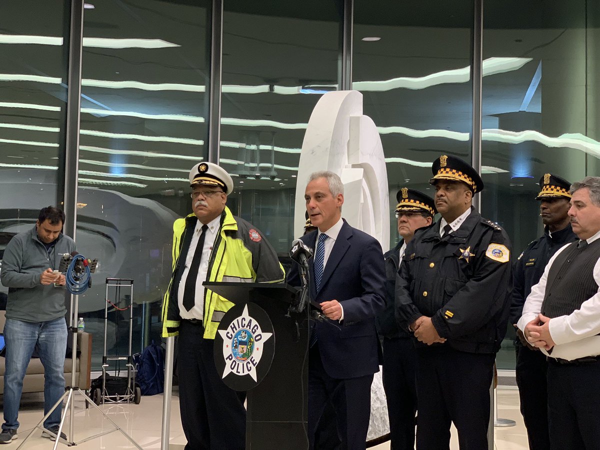 Mayor Rahm Emanuel and officials speak at a press conference at the University on November 19.