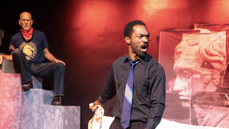 Joseph Beal as Plebian and Mikha’el Amin as Mark Antony in Julius Caesar at Invictus Theatre. 