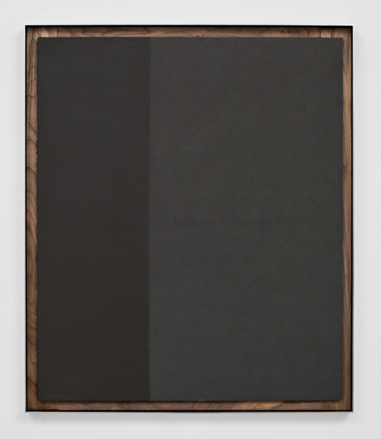 At first, Eduardo Consuegra’s “85%,” [pictured above] “90%,” and “98%” seem like monochrome black squares. You have to get up close to realize the titles refer to ratios of similarity between two shades of black in each painting.