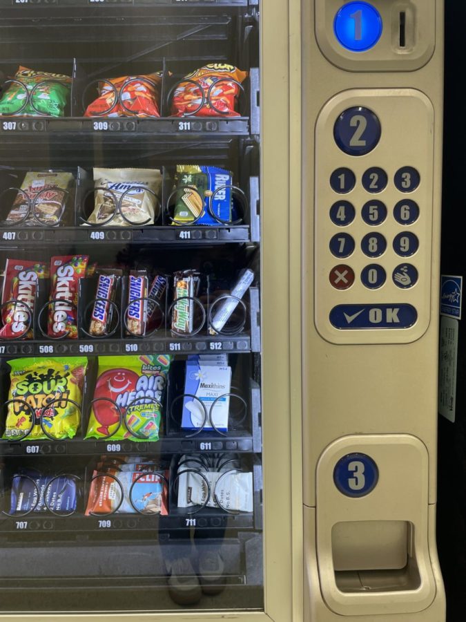 Menstrual products inside a vending machine.