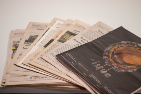 A stack of issues of The Maroon.