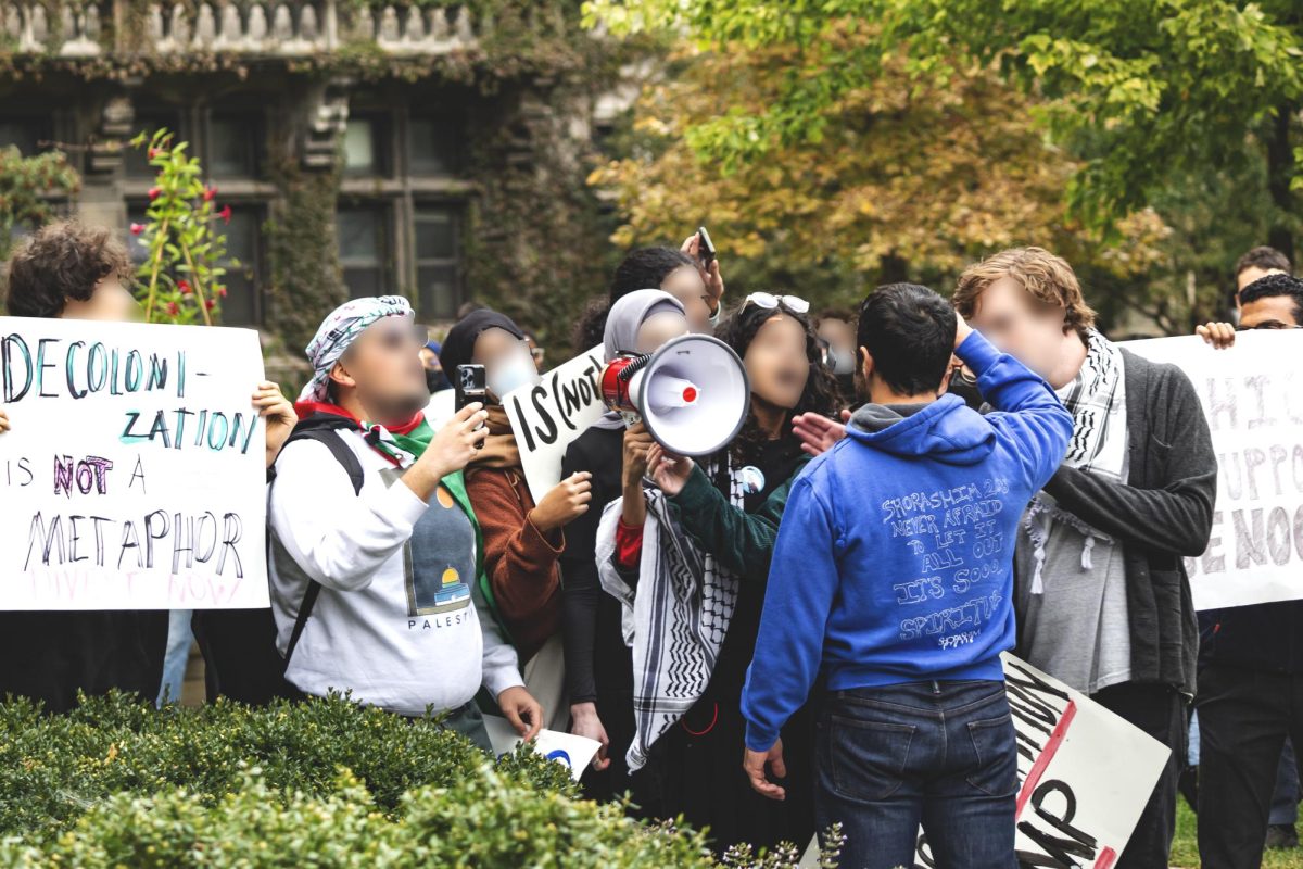 Supporters of Israel and Palestine confront each other during rallies on the quad 