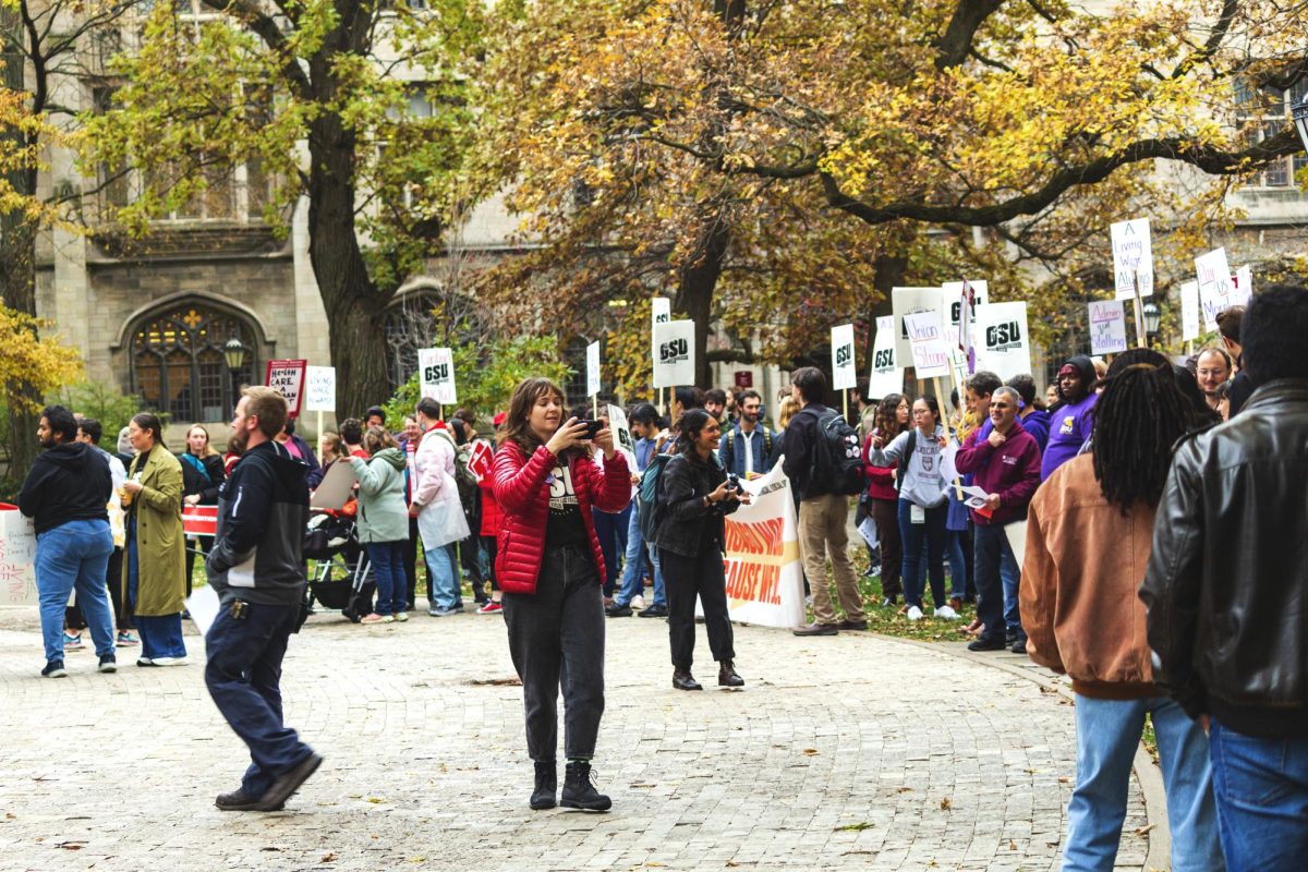 Members of a number of campus unions rally on the main quad.
