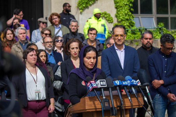 Faculty members of Faculty for Justice in Palestine speak at a press conference in front of Levi Hall.