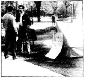 Part of the 1968 “tent-in” on the quad protesting the University’s sloppy housing policy for students. The sign leaning on the tent reads “free housing.”  
