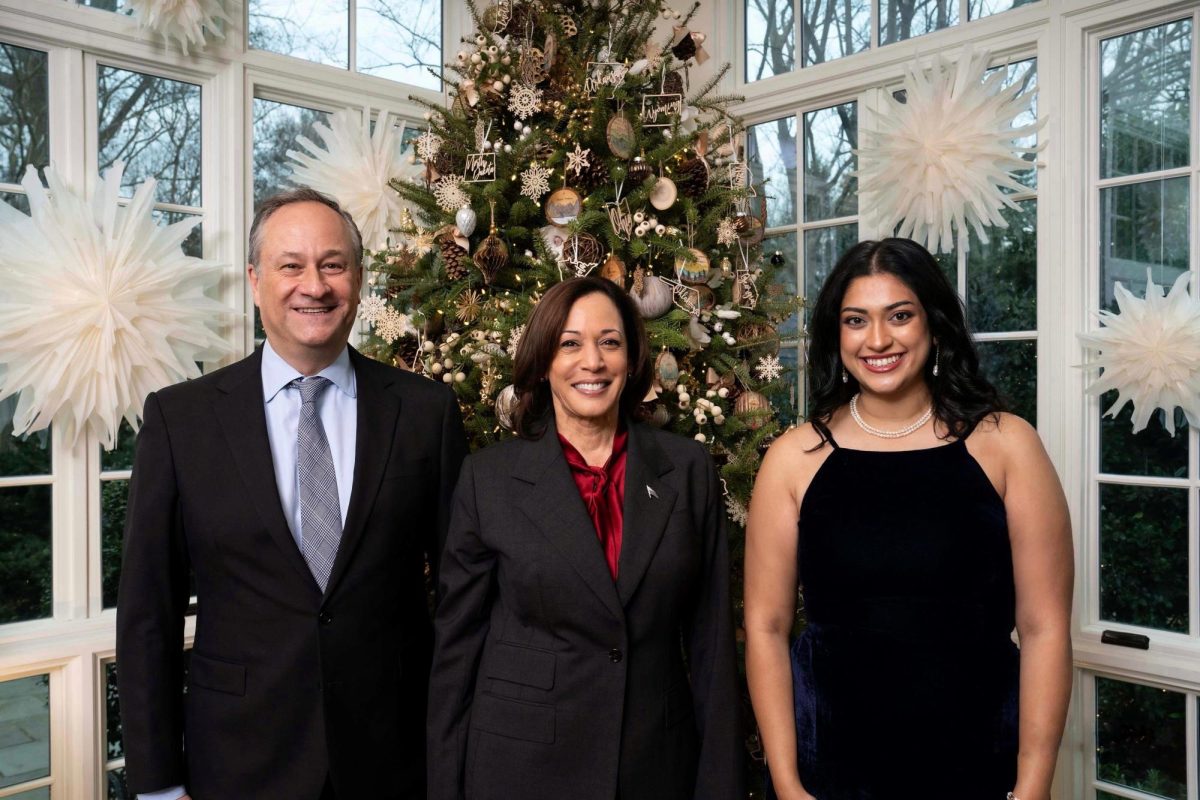 Megha Bhattacharya (A.B. '19, right) standing next to Vice President Kamala Harris (center) and Second Gentleman Doug Emhoff (left). (Courtesy of the Vice President's Office)