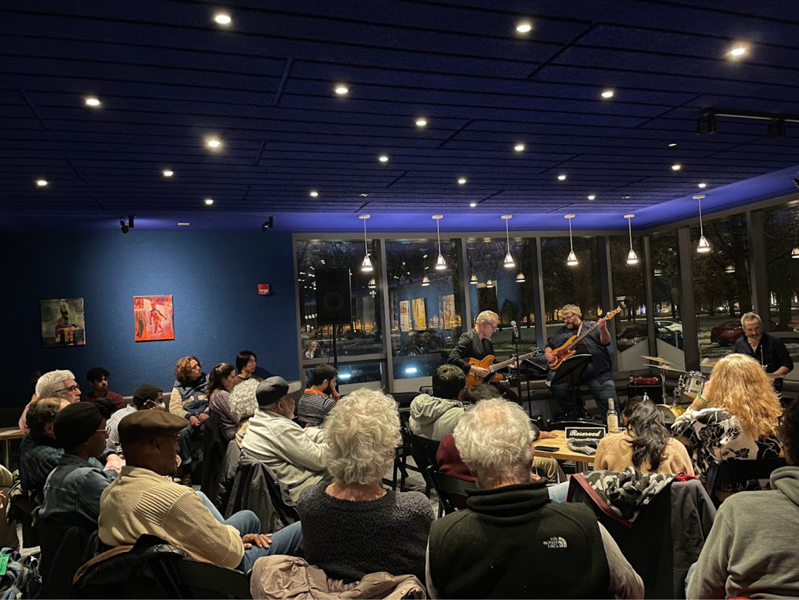 Attendees at Logan Center’s Third Tuesday Jazz concert, featuring The Regulators.