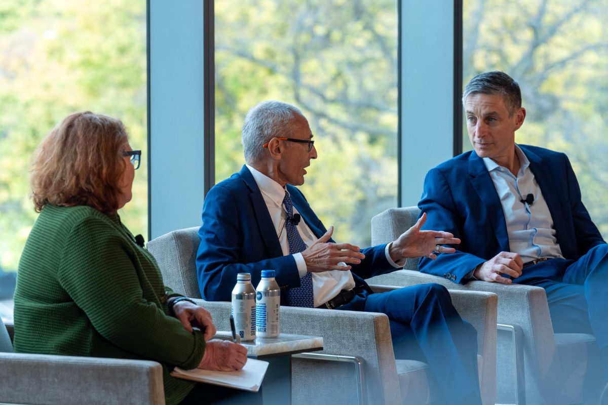 Michael Greenstone (left) participates in a panel during the launch of the institute on October 30. (Courtesy of Jason Smith)