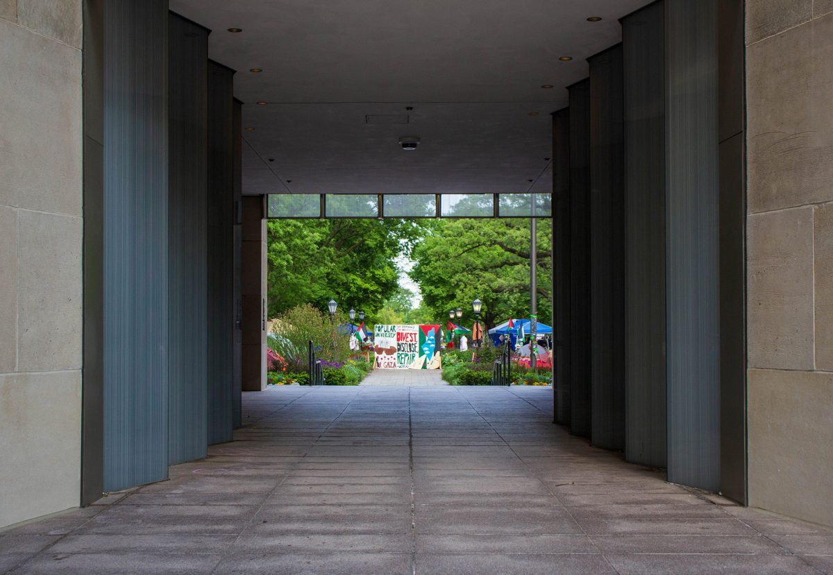 The pro-Palestine encampment as seen through the Levi Hall breezeway.