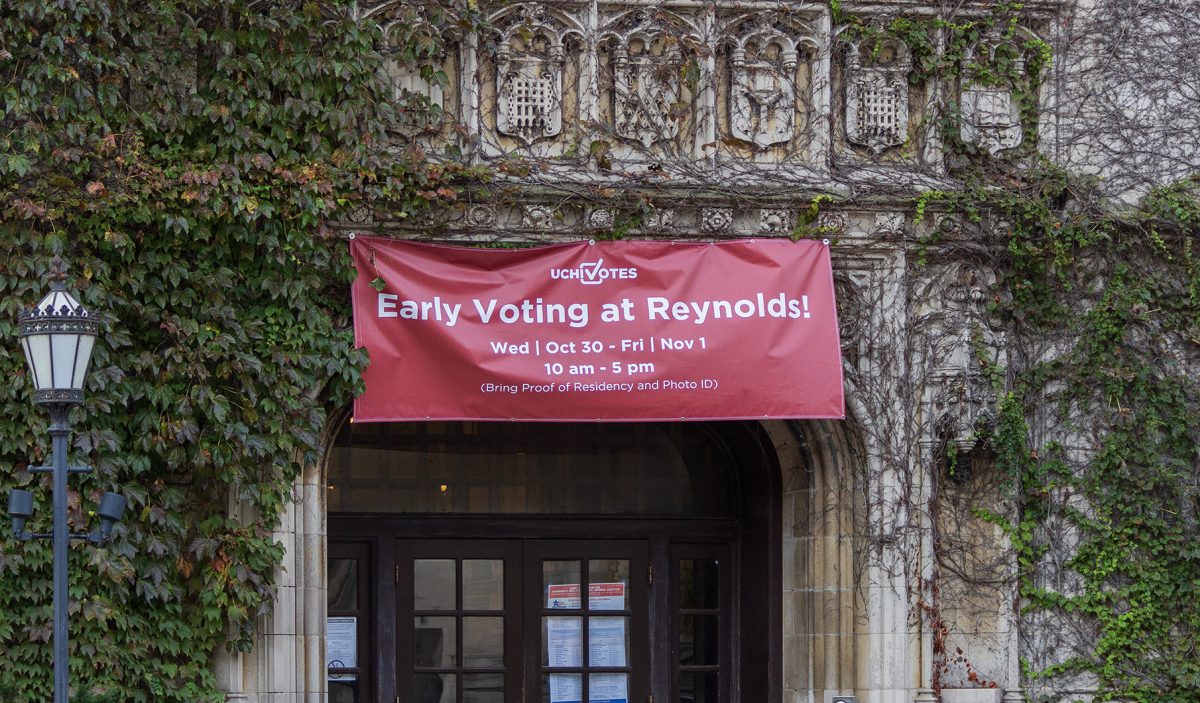 A banner for early voting at the entrance of the Reynolds Club.