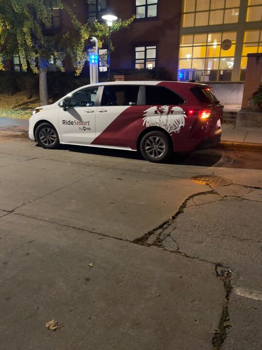 A Via Shuttle drops students off at Max Palevsky Residential Commons.