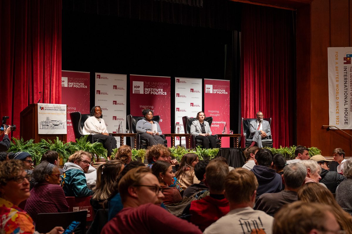 From Left: Undergraduates Alyssa Manthi, Alexandria Porter, and Shannon Dye, and Chicago Mayor Brandon Johnson take audience questions during the IOP event.