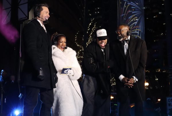 Ryan Chiaverini, Val Warner, Chance the Rapper, and Mayor Brandon Johnson transmitting live for ABC 7 from the main stage on Franklin Street.