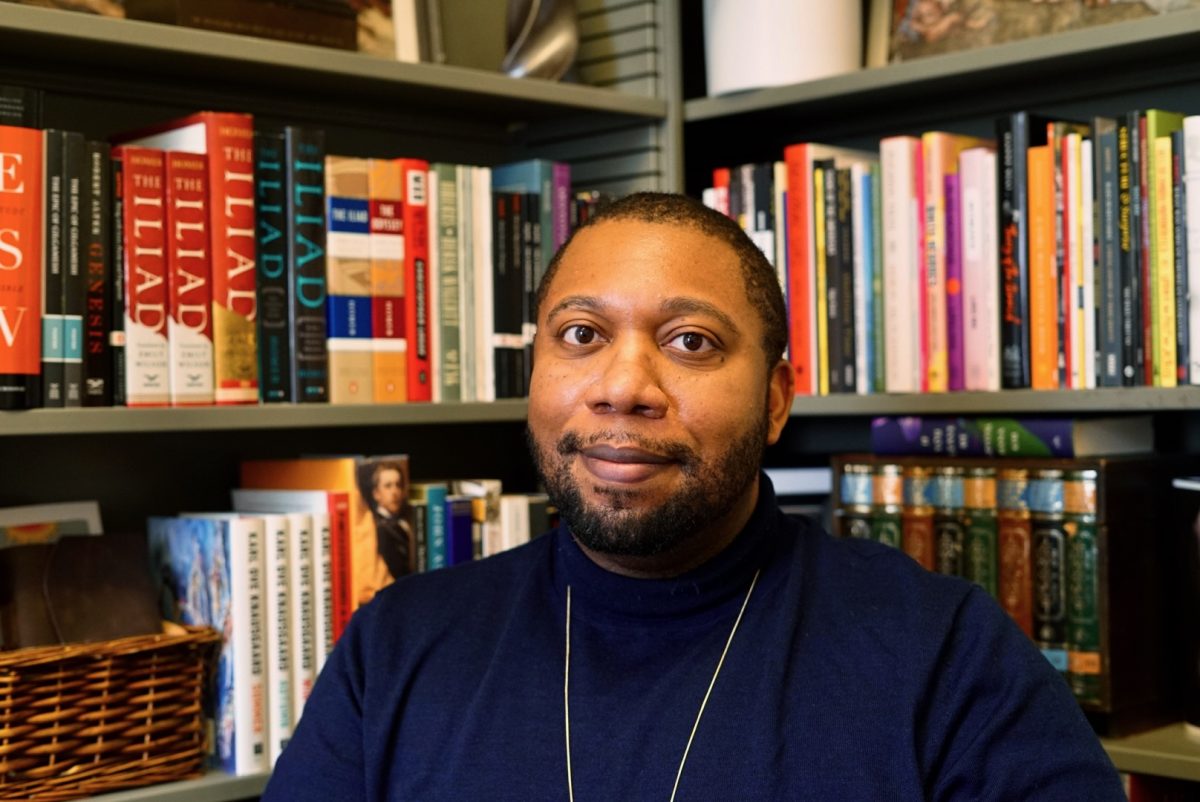 Collegiate Assistant Professor and Harper-Schmidt Fellow Korey Williams in his UChicago office. 