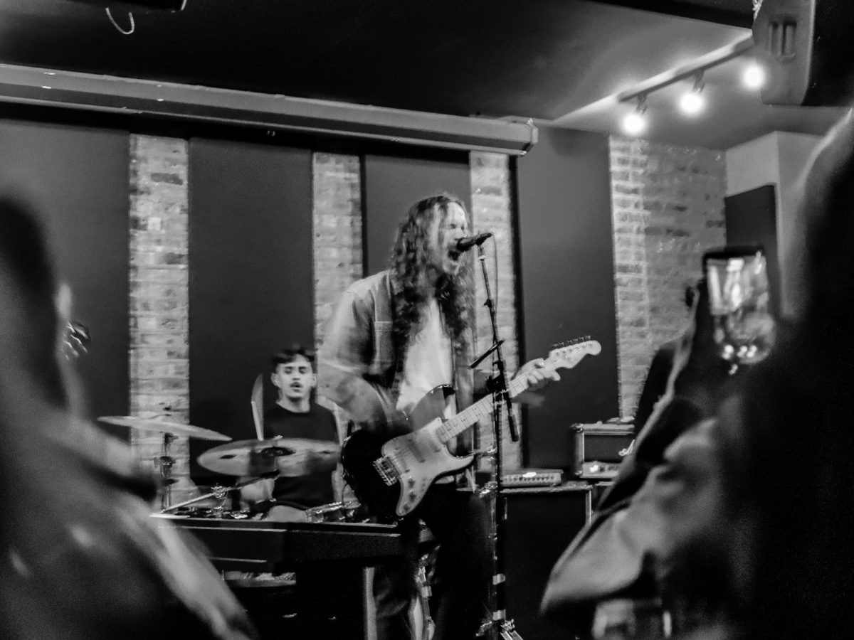 Ryan Rumchaks performs solo material at Gman Tavern.