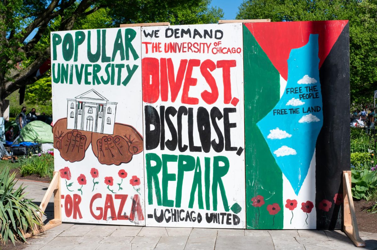 Sign in front of the SJP Encampment in May, 2024