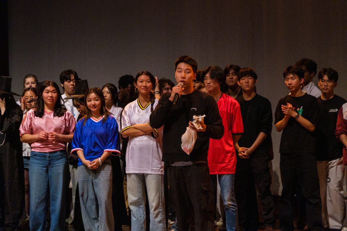 Third-year Hudson Chung, president of KSO, thanks the audience for attending after the Culture Show.
