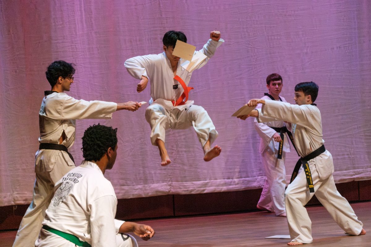 First-year Leo Liang performs a double flying kick during UChicago Taekwondo’s showcase.