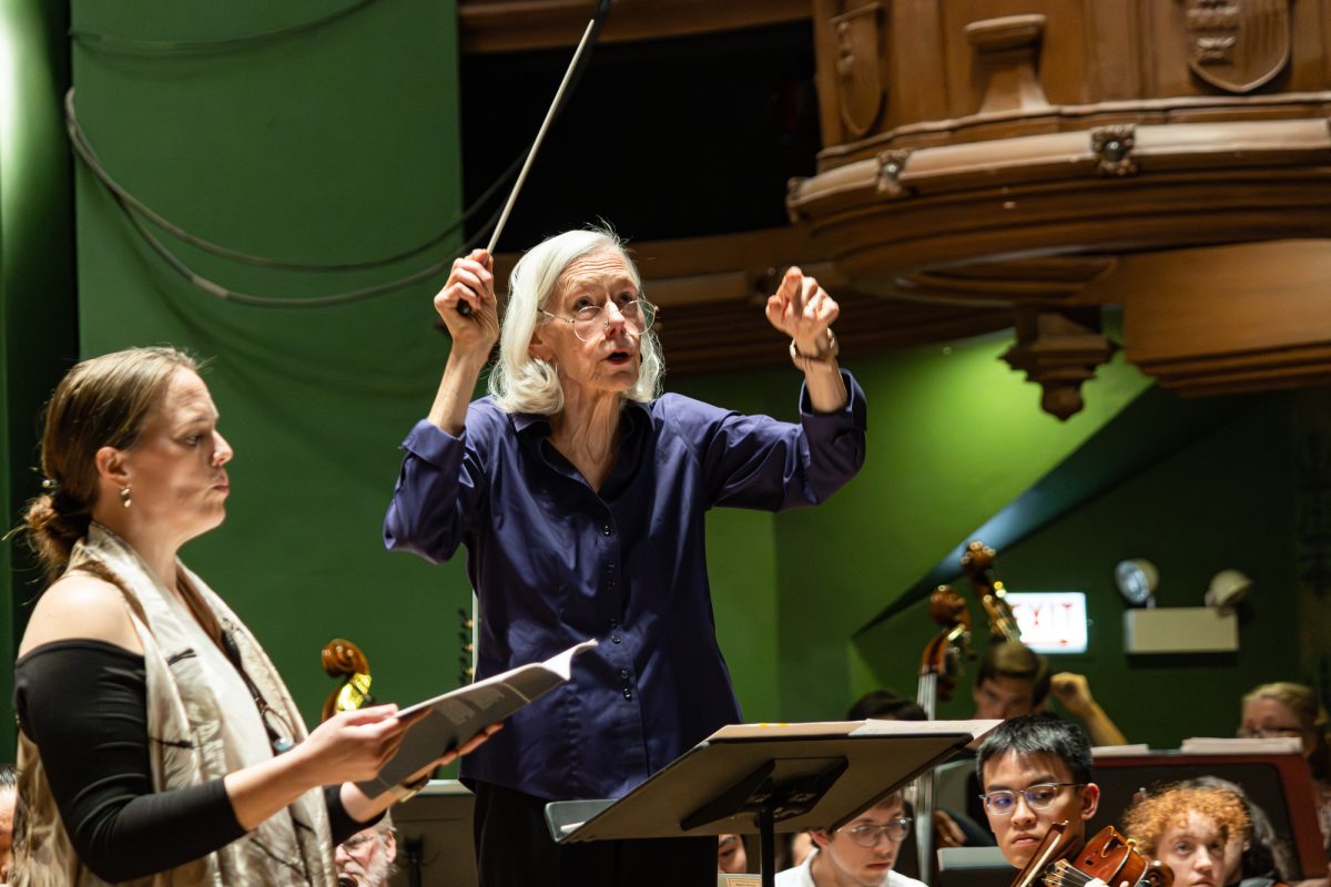 Schubert leads the University Symphony Orchestra in rehearsal.