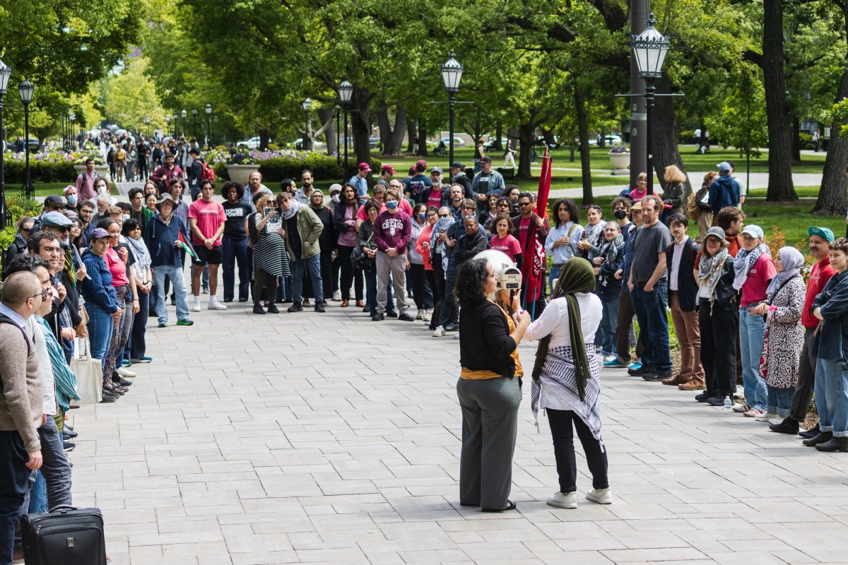 Members of UChicago United for Palestine at a protest on the main quad on Friday.