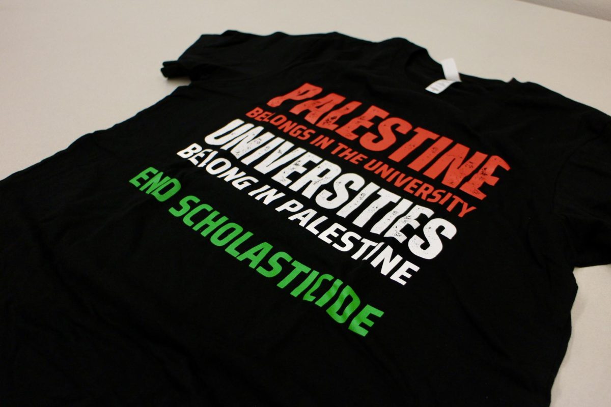 The shirt worn by Professor Soroush protesting scholasticide.