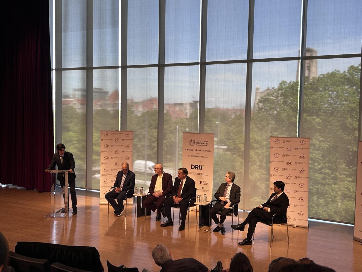 From left to right, Sebastian Villamil, who introduced the panel; panelists David Axelrod, Tom Ginsburg, Jonathan Turley, and John Pinheiro; and moderator Akshay Kirthi at the summit.